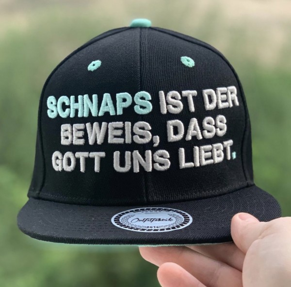Snapback Cap SCHNAPS IST DER BEWEIS, schwarz/mint